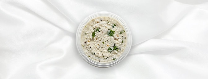 Coconut Chutney — The quintessential cooling companion. Freshly prepared with a tropical heart, this smooth coconut based and