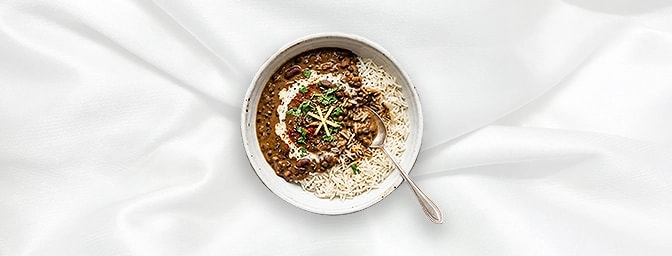 Dal Makhni Rice Bowl - Taster — featuring a perfect duo of velvety black lentils�simmered overnight on the tandoor and finish