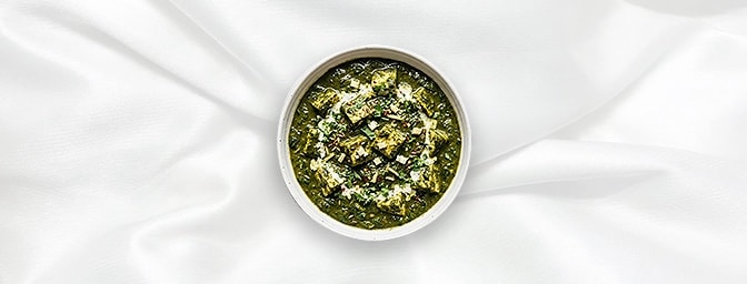 Palak Paneer - Taster — Pure vegetarian elegance. Home-made cottage cheese cubes are gently folded into a velvety, iron-rich