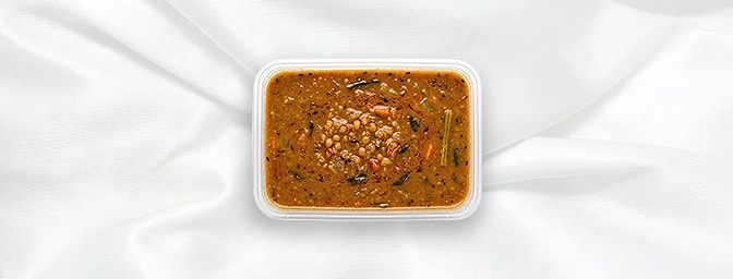 Sambhar — A soul-warming South Indian classic. This hearty, aromatic lentil stew is slow-simmered with tangy tamarind, garden