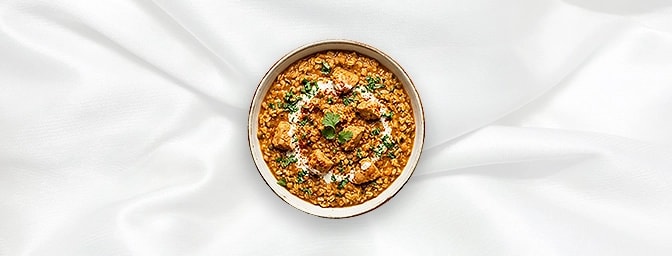 Butter Chicken Khichdi — A health-conscious, gourmet twist on comfort. We�ve replaced traditional grains with wholesome oats,
