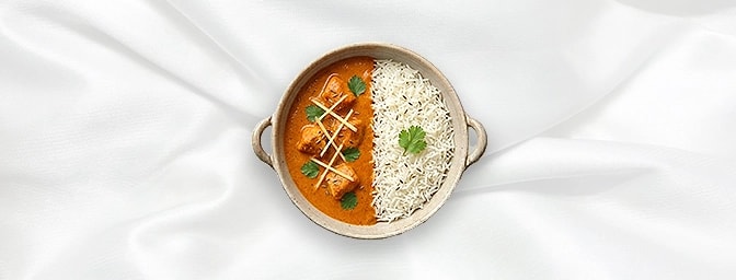 Butter Chicken Rice Bowl- Taster — Experience pure indulgence in a perfectly portioned bowl. Our signature barbecued chicken