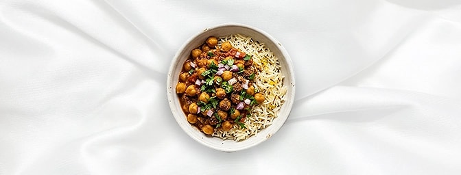 Chana Masala Rice Bowl - Taster — Enjoy a refined portion of our traditional Punjabi-style chickpeas, simmered to perfection