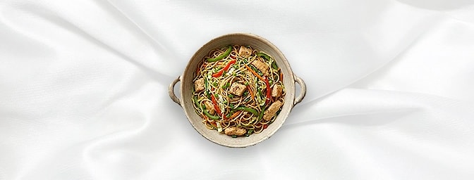 Chicken Hakka Noodles — Indulge in our signature stir-fry, featuring tender chicken strips and springy egg noodles. Wok-tosse