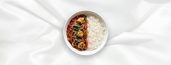 Chicken Jalfrezi Rice bowl — The ultimate balanced meal in one. This half-and-half combo features a zesty Chicken Jalfrezi al