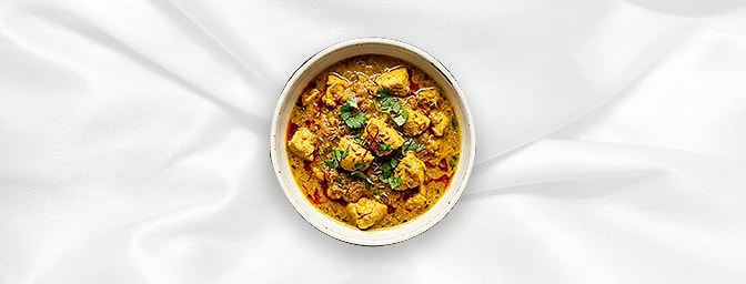 Chicken Madras - Taster — A sophisticated, fiery treat for chilli aficionados. Succulent chicken is simmered in a bold, spicy