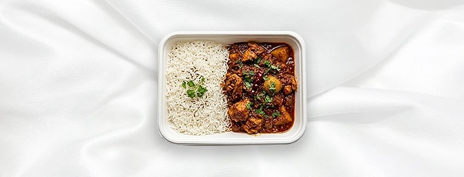 Chicken Vindaloo Rice Bowl — A fiery treat for chili aficionados. This bowl features half-portions of our hot, vinegar-infuse