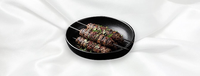 Adana Kofte — All Served With Salad And Wrapped With Hot Lavas Bread, GB Canteen Hitchin