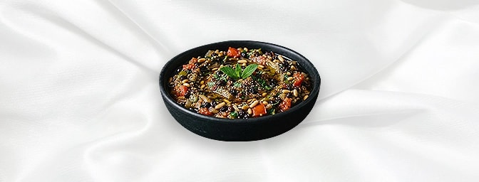 Imam Bayildi V N — Stuffed Aubergine With Dried Currants, Pine Nuts, Fresh Tomato, Onion, Green Pepper, Parsley And Hint Of G