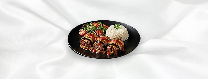 Islim Kebab Gf — Marinated Diced Lamb Cooked With Fried Onions, A Hint Of Garlic, Peppers, Tomato Sauce, Wrapped With Fried A