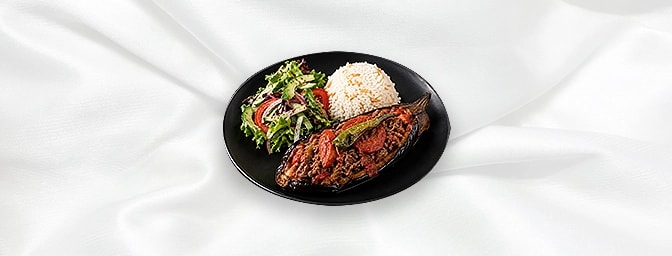 Karni Yarik Gf — Stuffed Aubergine, Fried Minced Lamb, Onions, Peppers, Parsley, Hint Of Garlic, Tomato Puree, Oven Baked. Se