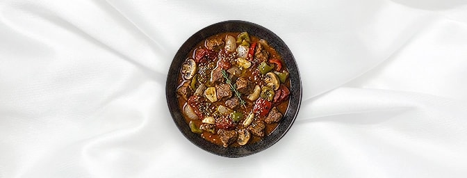 Lamb Casserole — Marinated Lamb Pieces With Onions, Garlic, Tomato, Peppers & Mushrooms, GB Canteen Hitchin