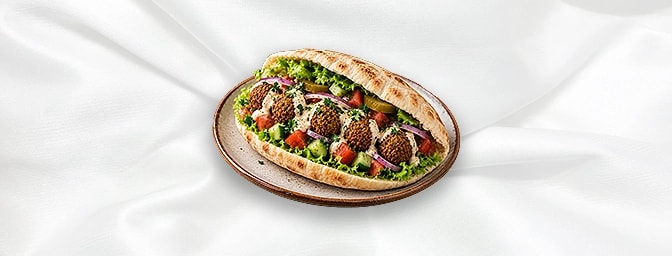 Falafel A Sandwiches — A deep fried ball or patty made from ground chickpeas, parsley, garlic, and spices. Its crispy on the