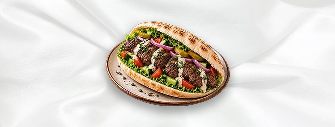Lamb Kafta Sandwiches — Similar to chicken kafta but made with ground lamb, seasoned with onions, parsley, cumin, and other M