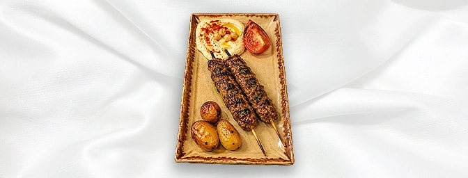 Lamb kafta — minced lamb, onion and parsley served with hommous dip, grilled onions & tomato, GB Canteen Lebanese Barnes