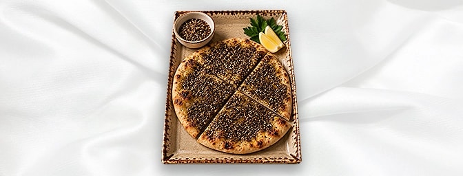 Manaeesh Zaatar A — Thyme, sumac & sesame flat bread, GB Canteen Lebanese Barnes