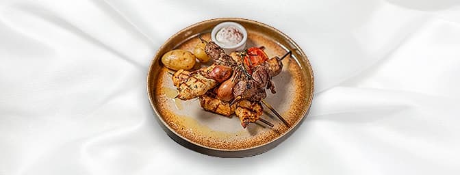 Mixed meat grill — Selection of lamb kafta, taouk, lahim meshoue and chicken kafta served with rice, GB Canteen Lebanese Barn