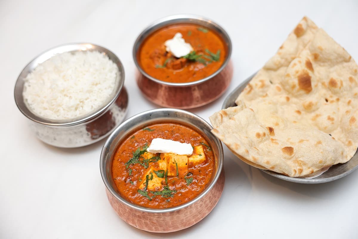 GBC Combo (Tikka Paneer Masala, Chicken Bhuna, Steam Rice, Garlic Nan)
