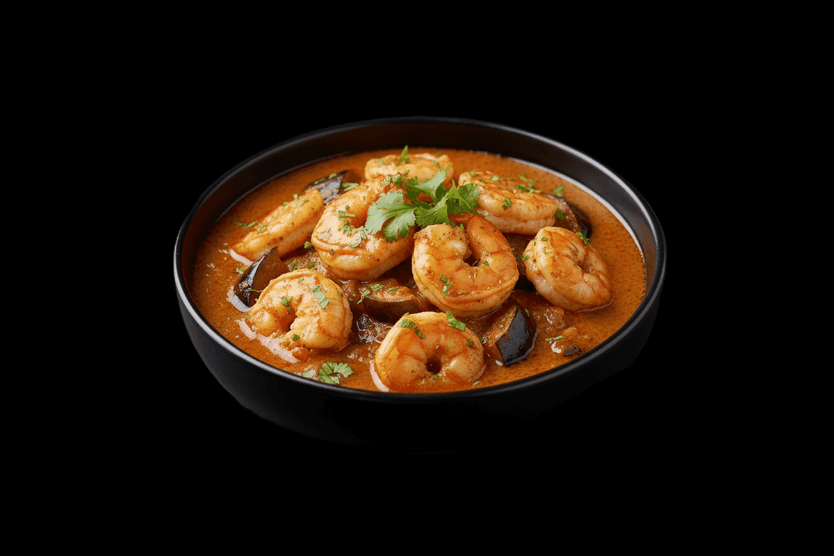Adda Jingha — Medium spiced king prawn curry cooked with garlic, aubergine and Spice Merchant�s own herb blend, GB Canteen Be