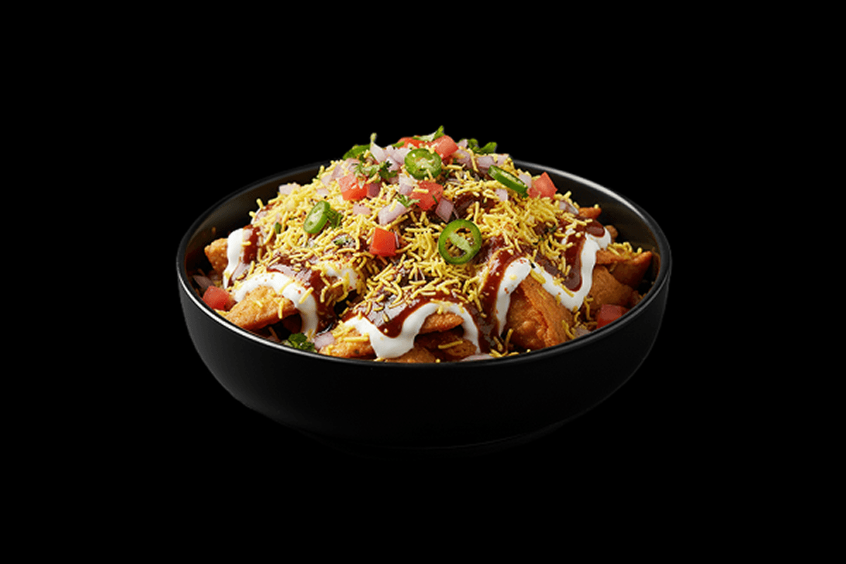 Punjabi Samosa Chaat — Smashed samosa topped with chickpeas, chutney, yoghurt, onions and spice, GB Canteen Beaconsfield