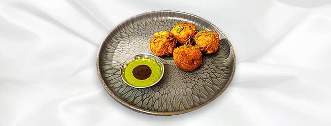 Onion Bhajee — Sliced onions mixed with spices and deep fried, GB Canteen Billericay