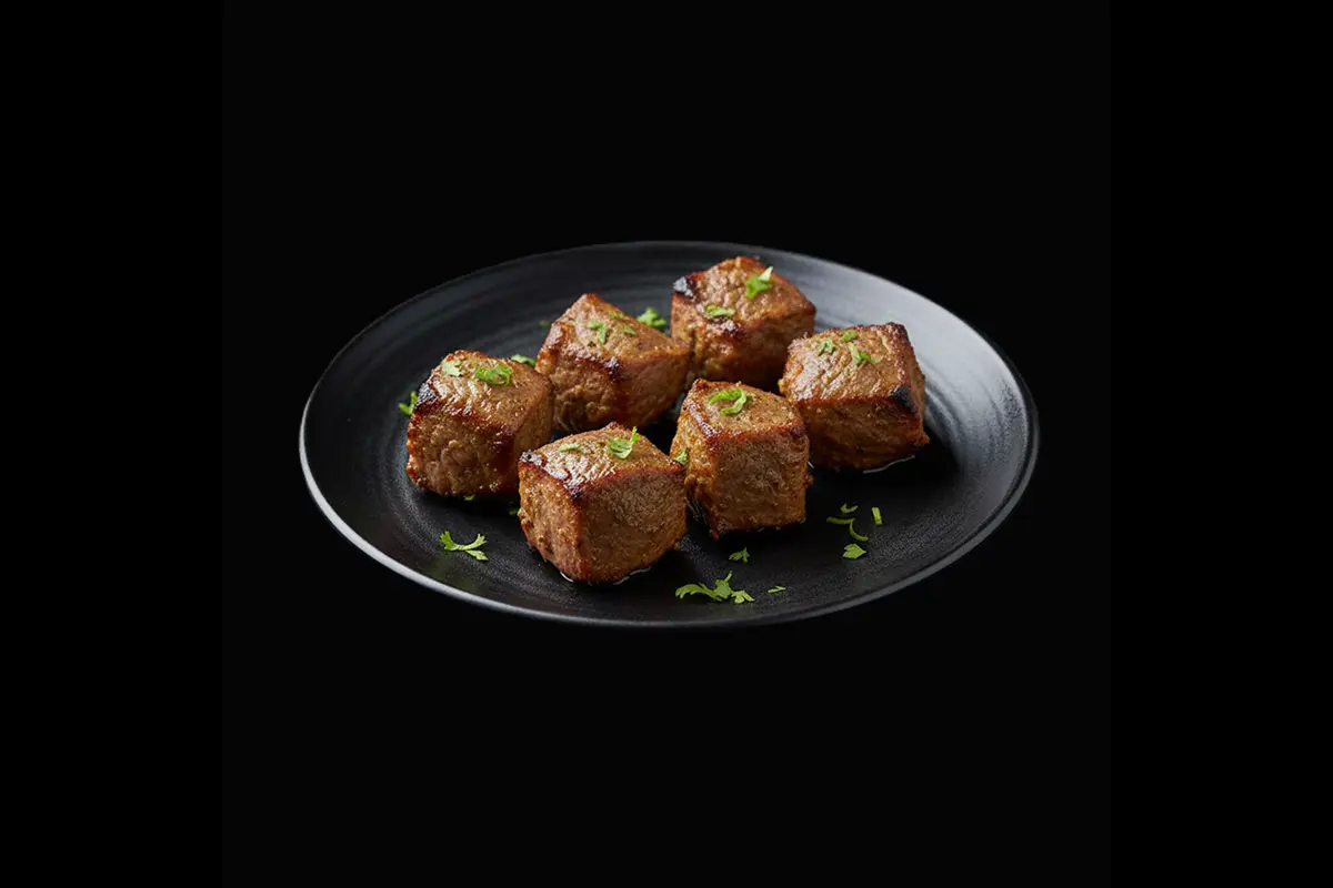 Chicken Kabuli Kebab — Barbecued boneless chicken marinated in mixed spices, filled with cottage cheese, grilled in a clay ov