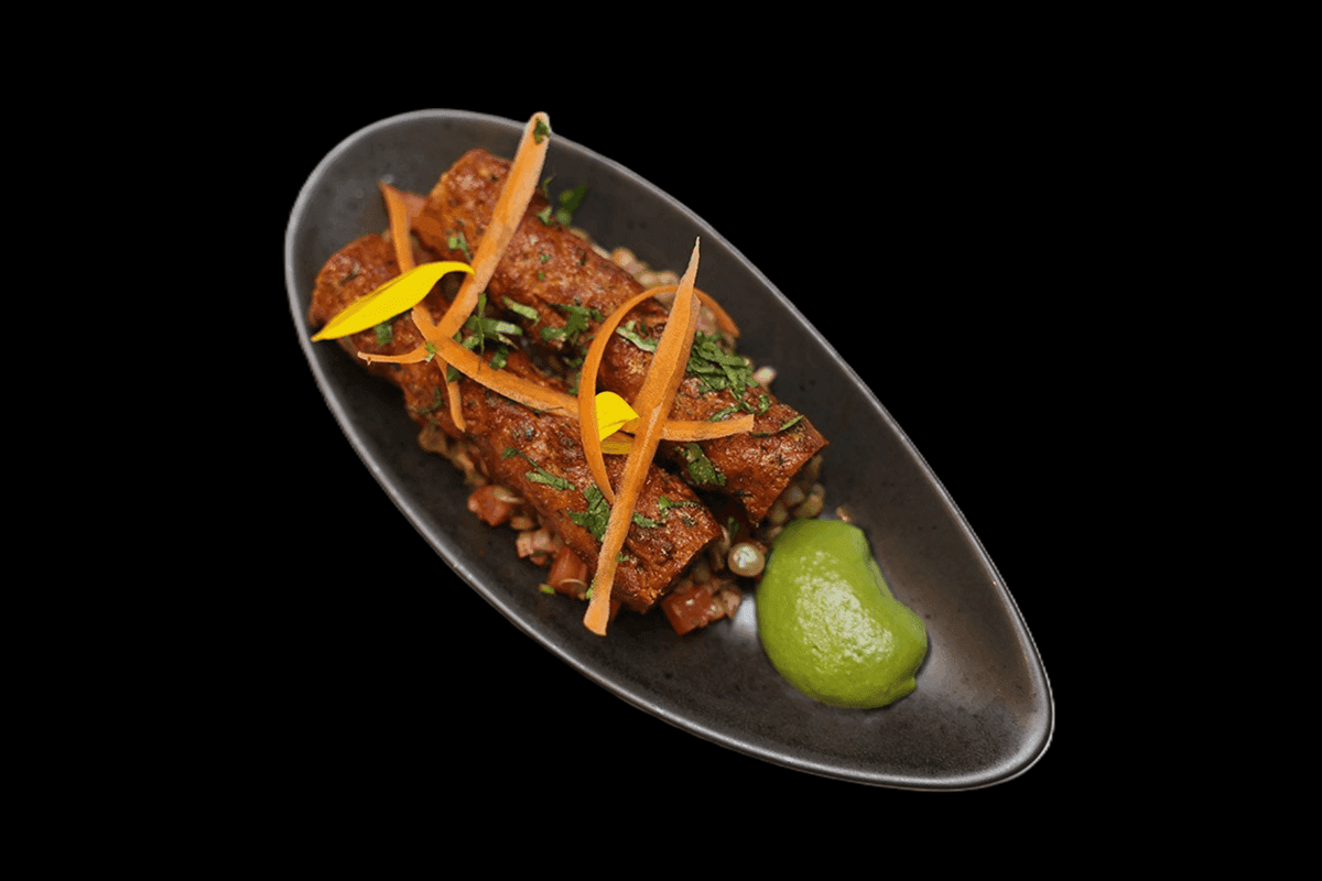 Barra Kebab — Lamb pieces marinated in warming masala spices with a hint of pineapple, grilled over flame, GB Canteen Beacons