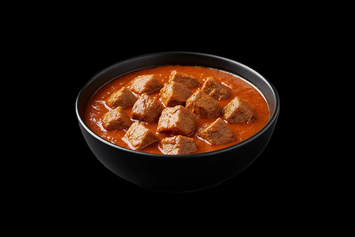 Bombay Flame — Chicken or lamb cooked with special naga chilli sauce to give a wonderful, GB Canteen Wellington