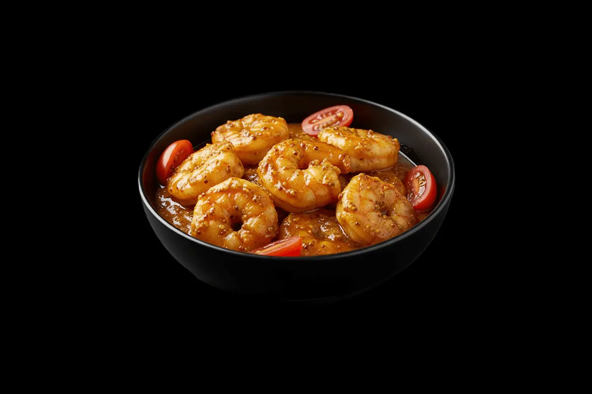 Gurkha Jingha — Large prawns marinated in whole grain mustard, lemon- juice and ground spices, cooked in a medium sauce garni