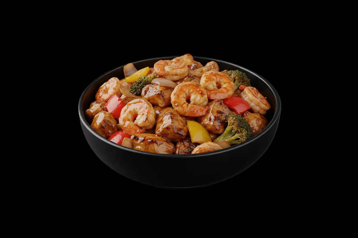 House Sizzler — A sizzling platter featuring a mix of meat, seafood, or vegetables served with a flavorful sauce, usually ser