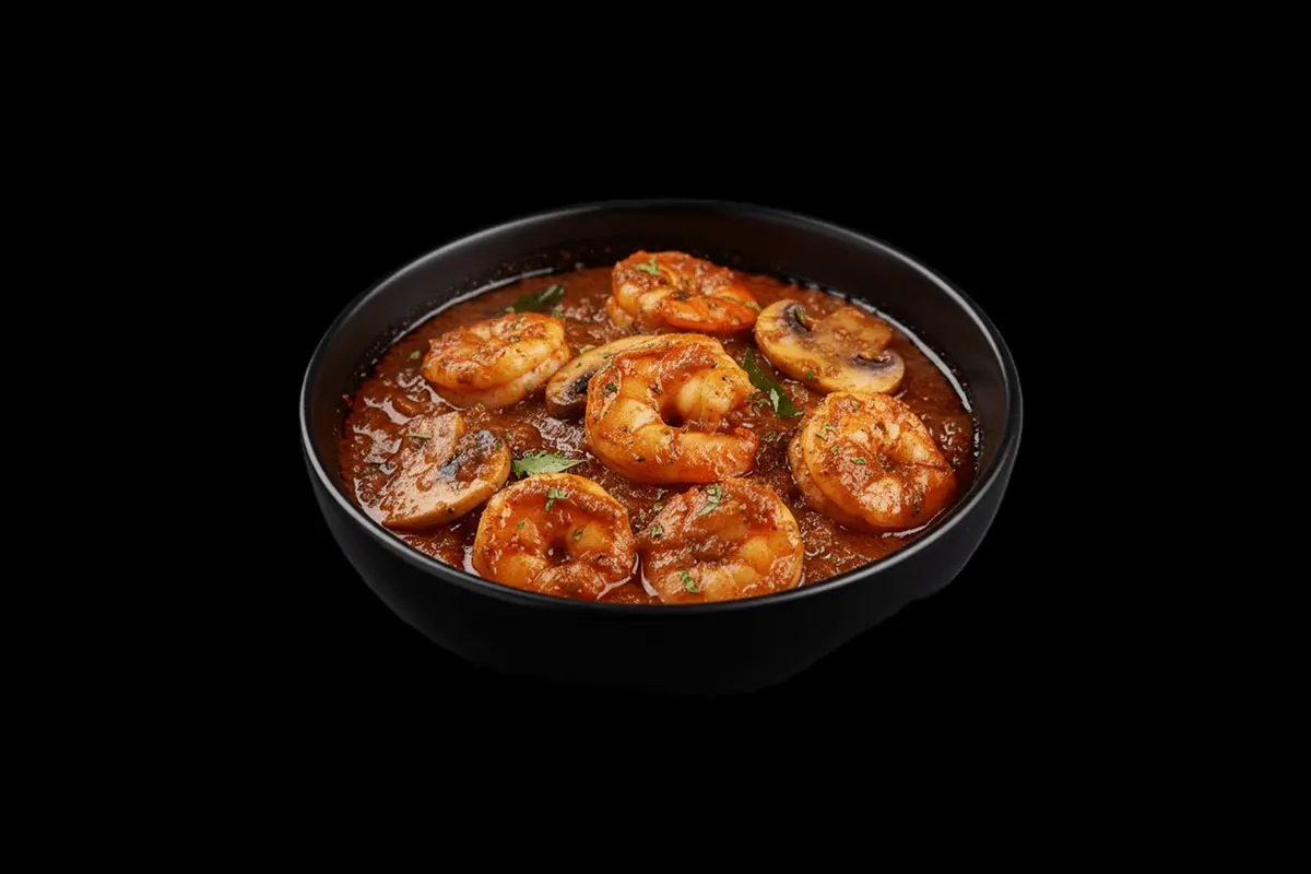 Jingha Balchou — King prawns cooked in a delicious hot, sweet and sour masala sauce with fresh mushroom. A classic goan dish.