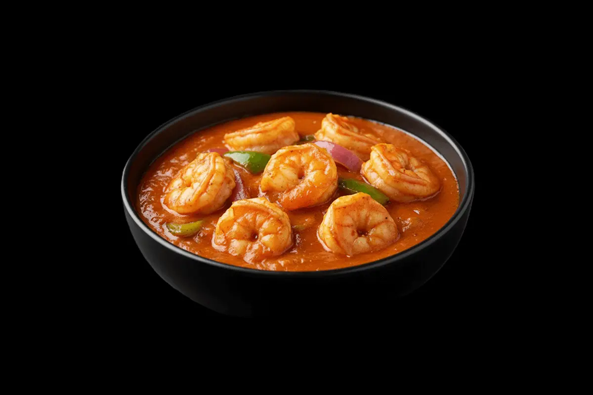 King Prawn Noorjahani — King prawn cooked to perfection with onions,peppers and a sauce consisting of yoghurt, tomato puree,