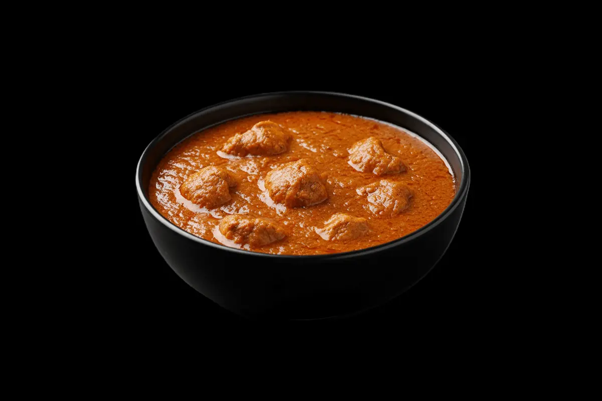 Chicken Rezalla — A tangy, spicy curry typically made with chicken, featuring a rich, aromatic sauce, GB Canteen Woodford Ind