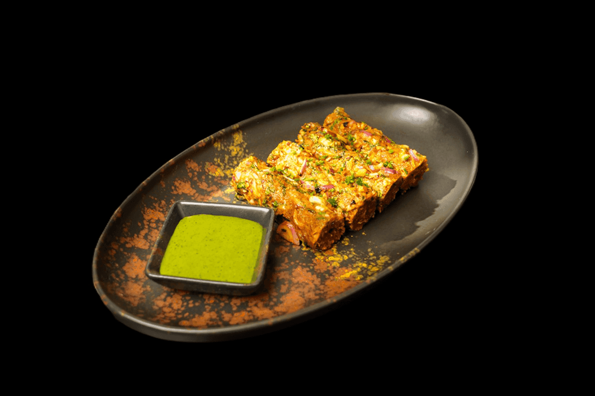 Lamb Seekh Kebab — Minced lamb, mixed with various herbs and spices, skewered and grilled in the tandoor. Medium, GB Canteen